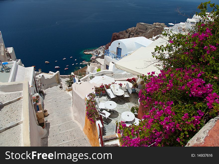 Santorini beautiful volcanic island in Greece landscape with blue churches, windmills and volcanic caldera