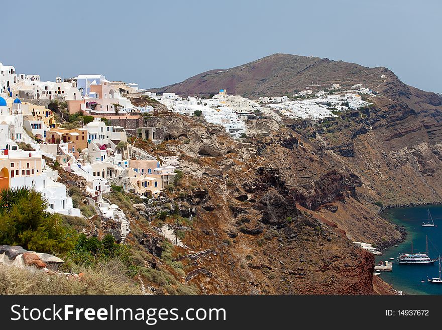 Santorini beautiful volcanic island in Greece landscape with blue churches, windmills and volcanic caldera