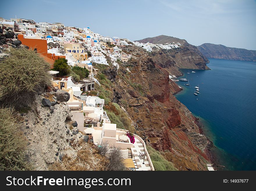 Santorini beautiful volcanic island in Greece landscape with blue churches, windmills and volcanic caldera