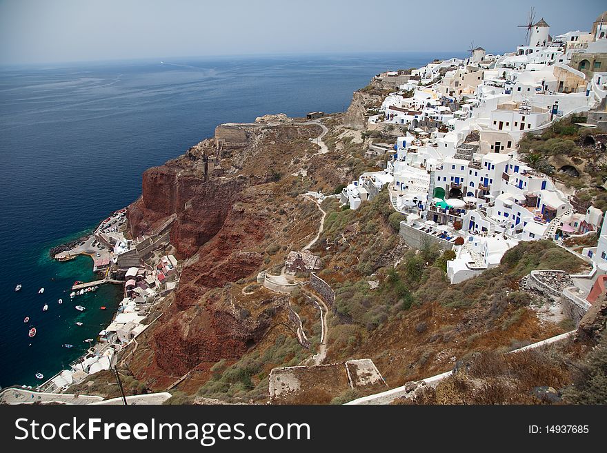 Santorini beautiful volcanic island in Greece landscape with blue churches, windmills and volcanic caldera