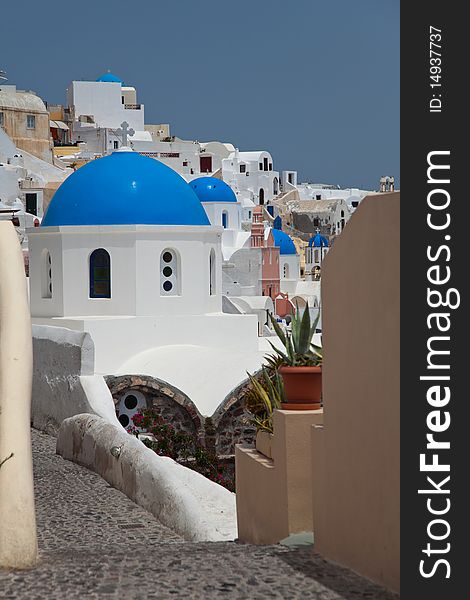 Santorini beautiful volcanic island in Greece landscape with blue churches, windmills and volcanic caldera