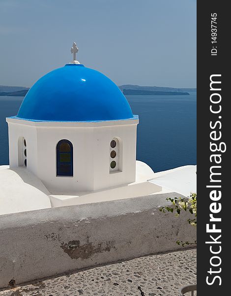 Santorini beautiful volcanic island in Greece landscape with blue churches, windmills and volcanic caldera