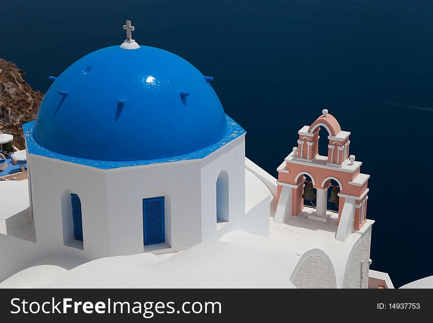 Santorini beautiful volcanic island in Greece landscape with blue churches, windmills and volcanic caldera