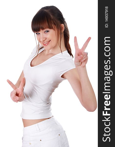 A charming young girl in a white T-shirt makes a sports exercise isolated on white