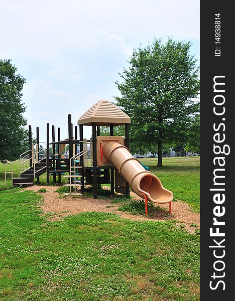 Slides and other playground equipment in a public park