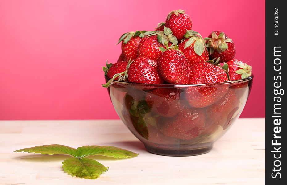 Close-up view of the bowl with fresh strawberry. Close-up view of the bowl with fresh strawberry