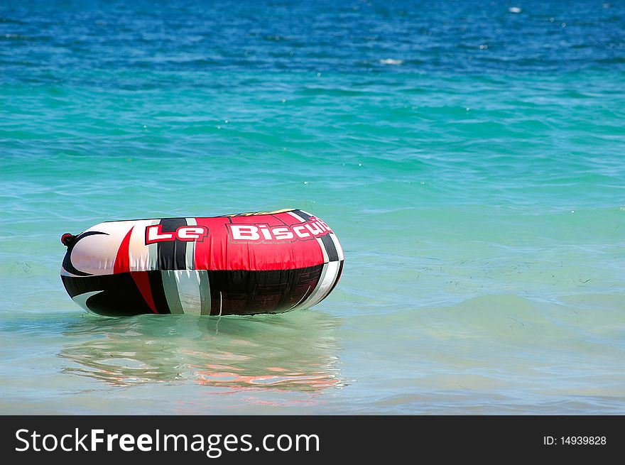 Inflatable ring floating on the sea off the Spanish coast. Inflatable ring floating on the sea off the Spanish coast.