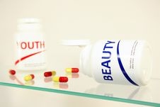 Free Beauty And Youth Pills In A Bottle Royalty Free Stock Images - 14944939