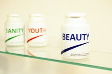 Sanity, Beauty And Youth Pills In A Bottle Stock Image Sanity, Beauty And Youth Pills In A Bottle Stock Image
