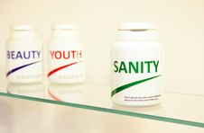 Free Sanity, Beauty And Youth Pills In A Bottle Royalty Free Stock Image - 14944966
