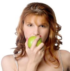Woman Biting Apple Royalty Free Stock Photography