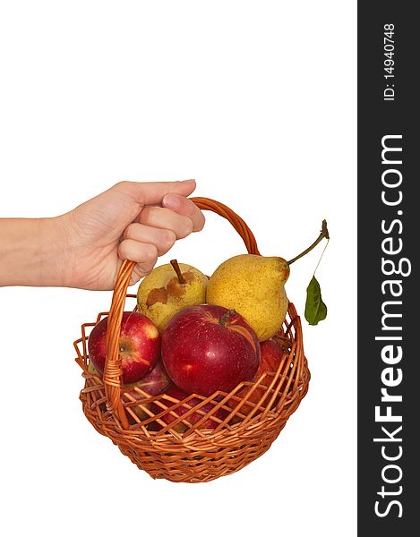 Basket with yellow pears and red apples in the hand. Basket with yellow pears and red apples in the hand