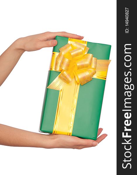 Woman giving a green box with yellow bow as a gift. Woman giving a green box with yellow bow as a gift