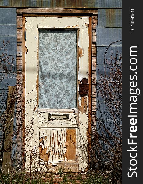 The front door of an abandon miners shack in the ghost town Tuscarora Nevada. The front door of an abandon miners shack in the ghost town Tuscarora Nevada