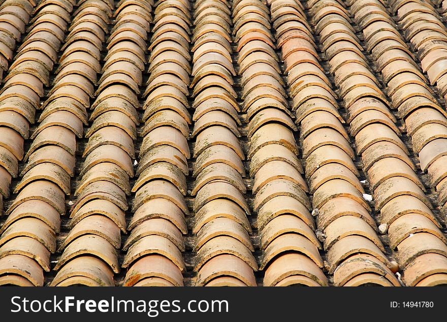 A classic red tiles roof - diagonal. A classic red tiles roof - diagonal