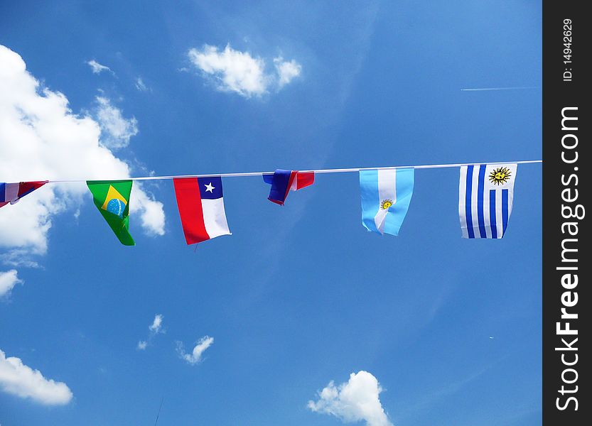 A collection of flags put up to support various nations in the world cup. A collection of flags put up to support various nations in the world cup.