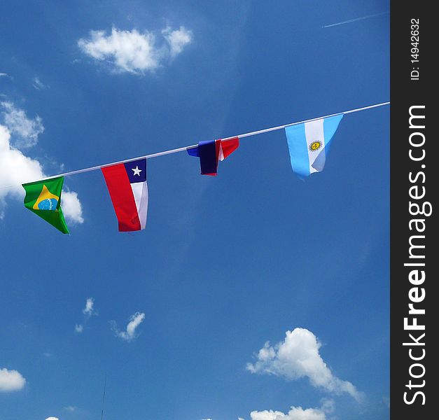 A collection of flags put up to support various nations in the world cup. A collection of flags put up to support various nations in the world cup.