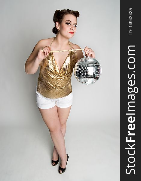 model holding mirrored disco ball. model holding mirrored disco ball