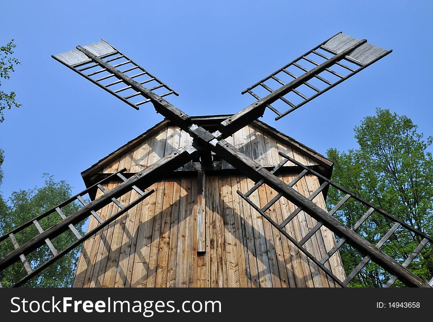 Wooden windmill in czech old traditional village. Wooden windmill in czech old traditional village