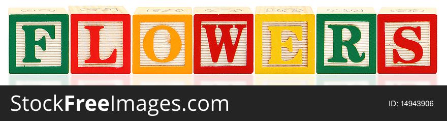 Colorful alphabet blocks. FLOWERS over white background. Colorful alphabet blocks. FLOWERS over white background.