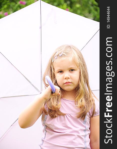 Girl with umbrella walking in summer rain. Girl with umbrella walking in summer rain