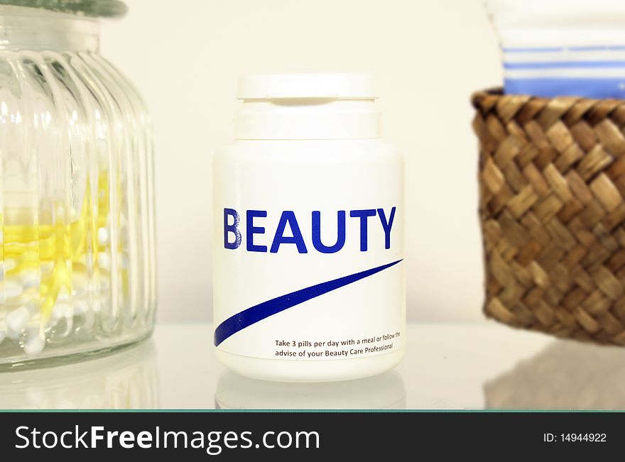 Beauty pills in a bottle on bathroom shelf, fake brand