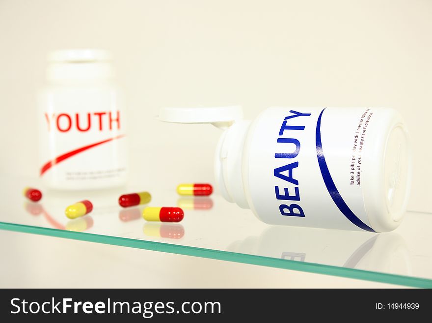 Beauty and youth pills in a bottle on bathroom shelf, fake brands