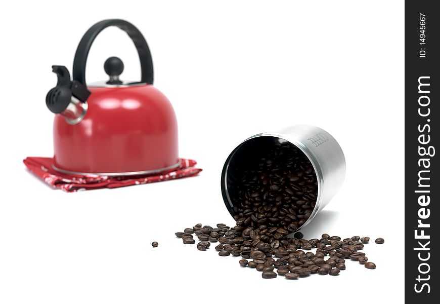 Coffee beans in a canister isolated against a white background