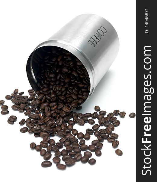 Coffee beans in a canister isolated against a white background