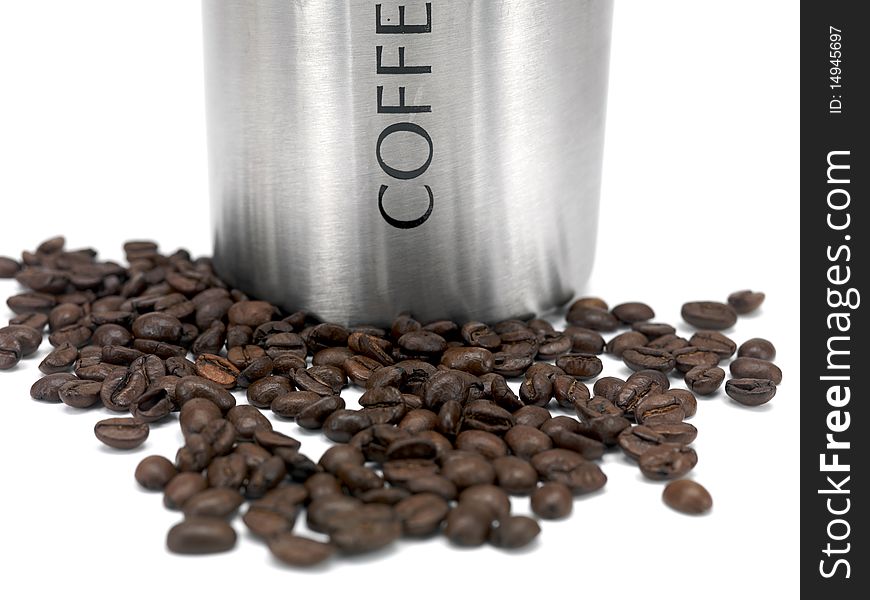 Coffee beans in a canister isolated against a white background