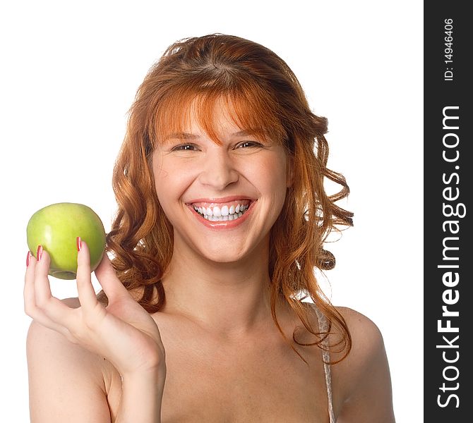 Young beautiful smilling woman holding an green apple. Young beautiful smilling woman holding an green apple