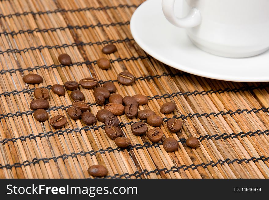 Macro of coffee beans on table