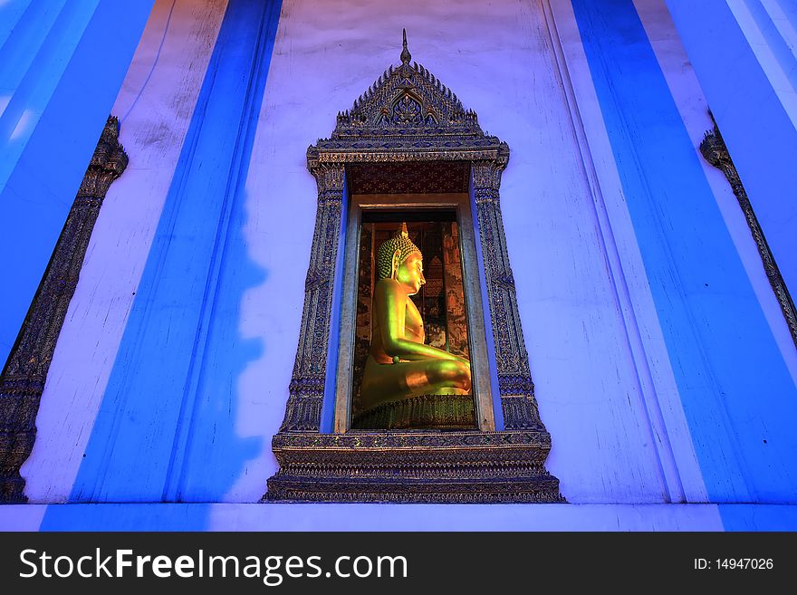 Golden buddha statue twilight , Bangkok, Thailand. Golden buddha statue twilight , Bangkok, Thailand