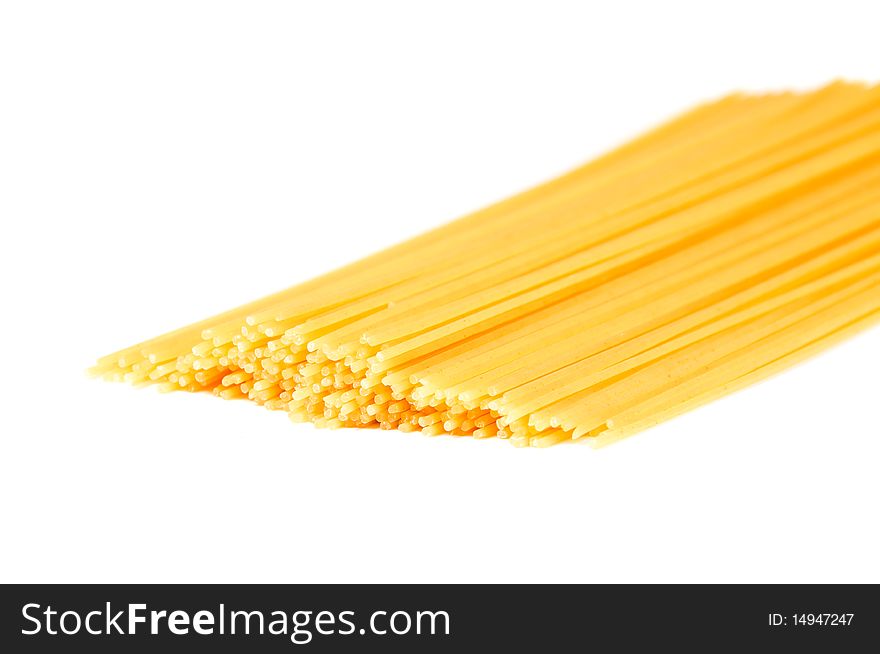 Long spaghetti over white background