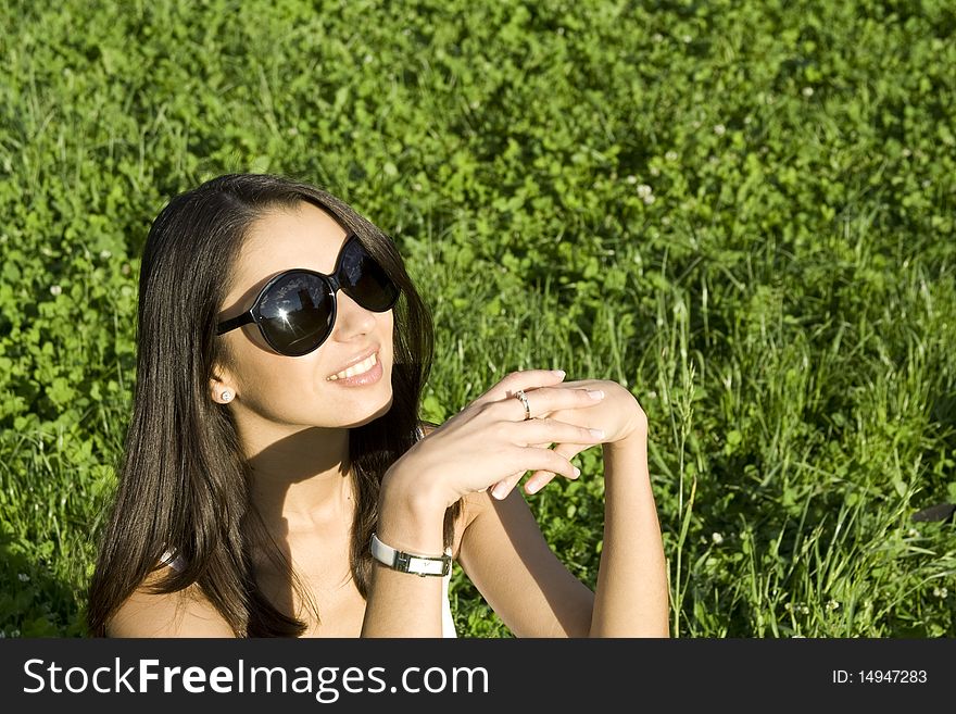 Beautiful young woman outdoors in nature. Portrait. Beautiful young woman outdoors in nature. Portrait