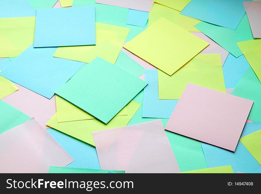 Background of bright pieces of paper notes. Background of bright pieces of paper notes
