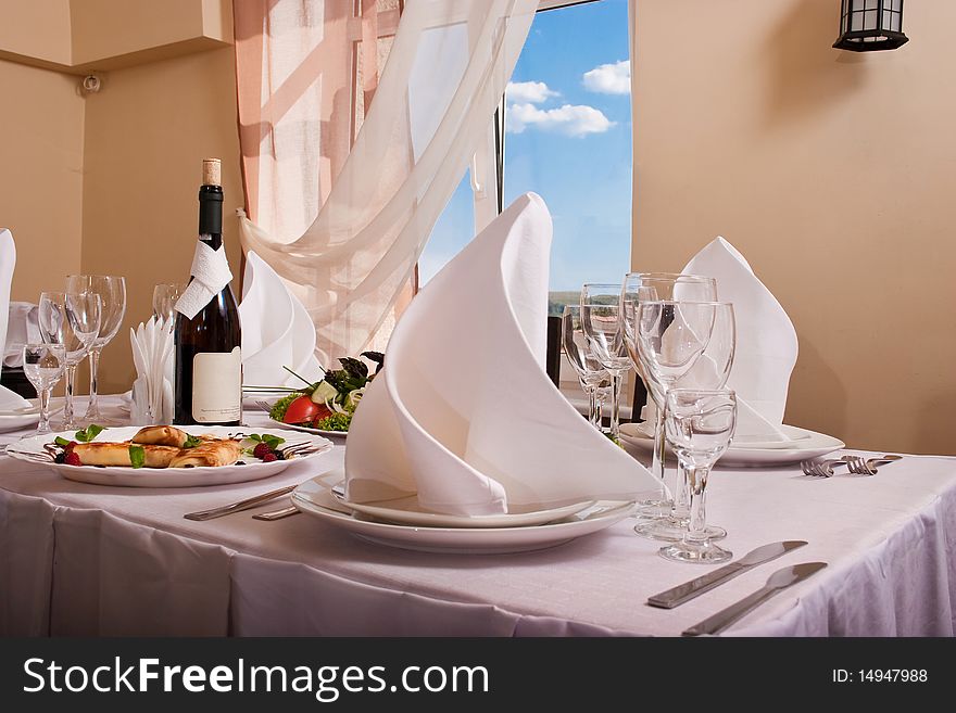 Excellent served table in front of window with nice sight