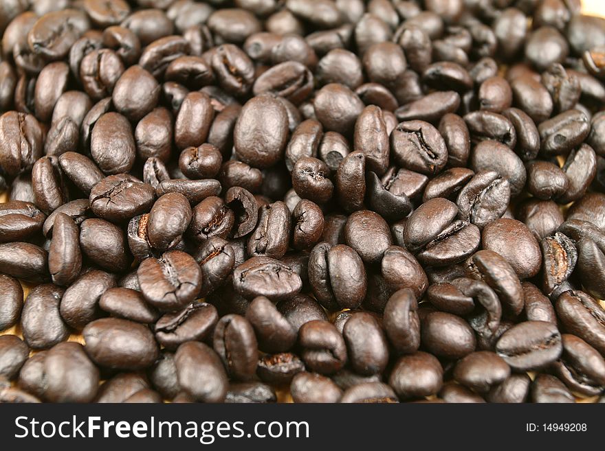 Coffee beans background. Dark roasted. Coffee beans background. Dark roasted