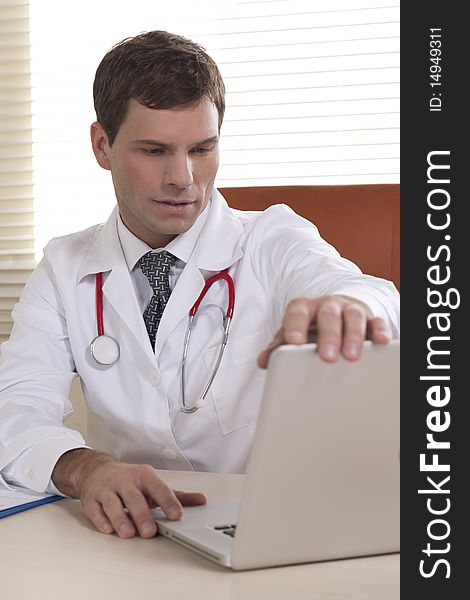 Portrait of a male doctor in his office