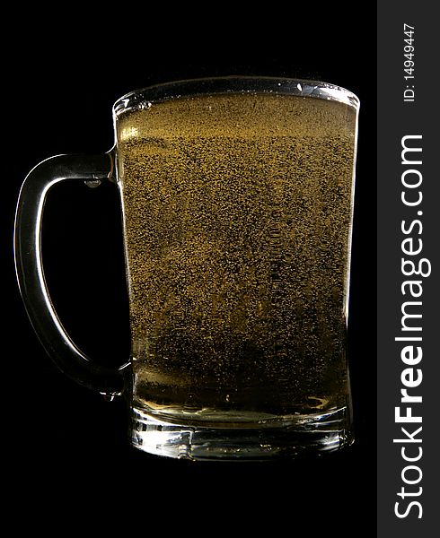 Cider in pint glass in studio