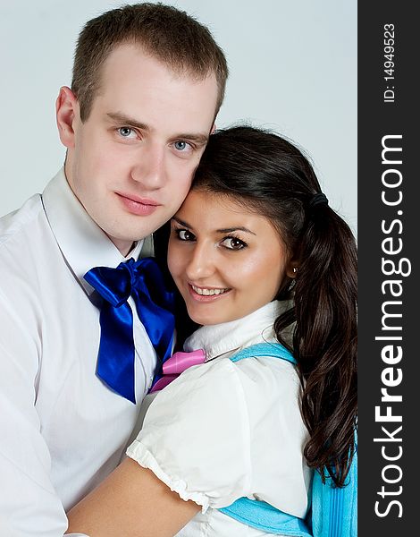 Two happiness fun students on a white background