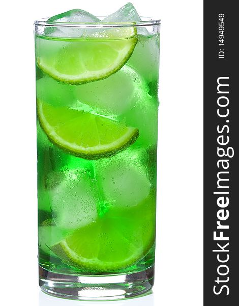 Green alcohol cocktail with lime on white background. Green alcohol cocktail with lime on white background