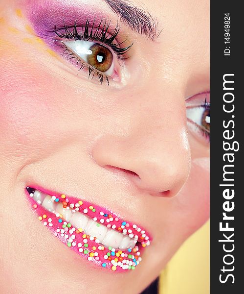 Close-up fashion shot of woman face with creative make-up