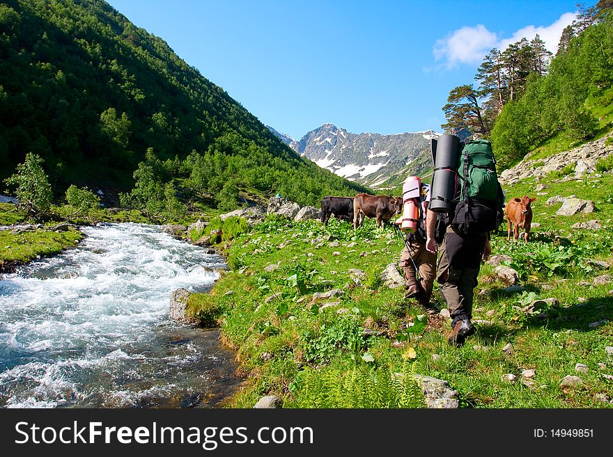 Hiker boys in Caucasus mountains