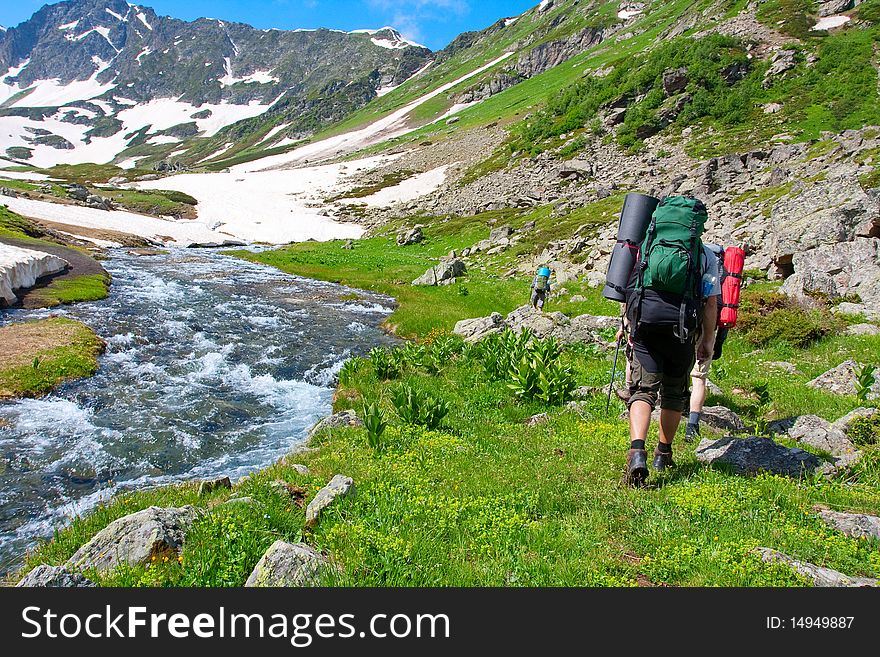 Hiker boys in Caucasus mountains