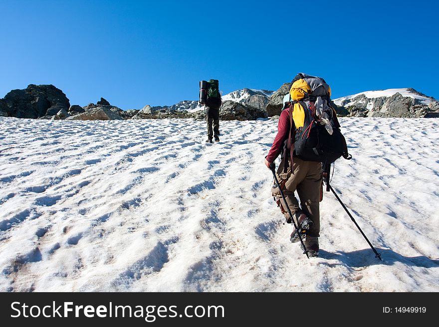 Hiker boys in Caucasus mountains