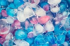 Free Background With Transparent, White, Pink And Blue Ice Cubes. Fresh Summer Pattern. Flat Lay Royalty Free Stock Photography - 149456427