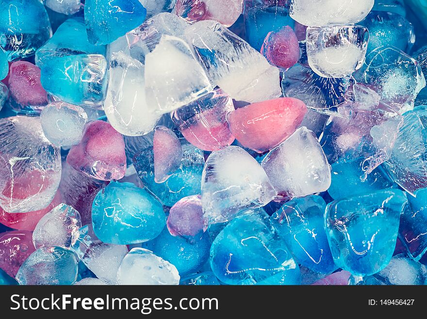 Background with transparent, white, pink and blue ice cubes. Fresh summer pattern. Flat Lay