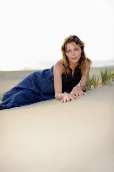 Beautiful Woman Sitting On The Beach In A Sand Stock Photo Beautiful Woman Sitting On The Beach In A Sand Stock Photo