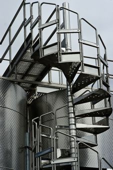 Chrome Circular Stairway & Wine Fermentation Tanks Stock Photography Chrome Circular Stairway & Wine Fermentation Tanks Stock Photography
